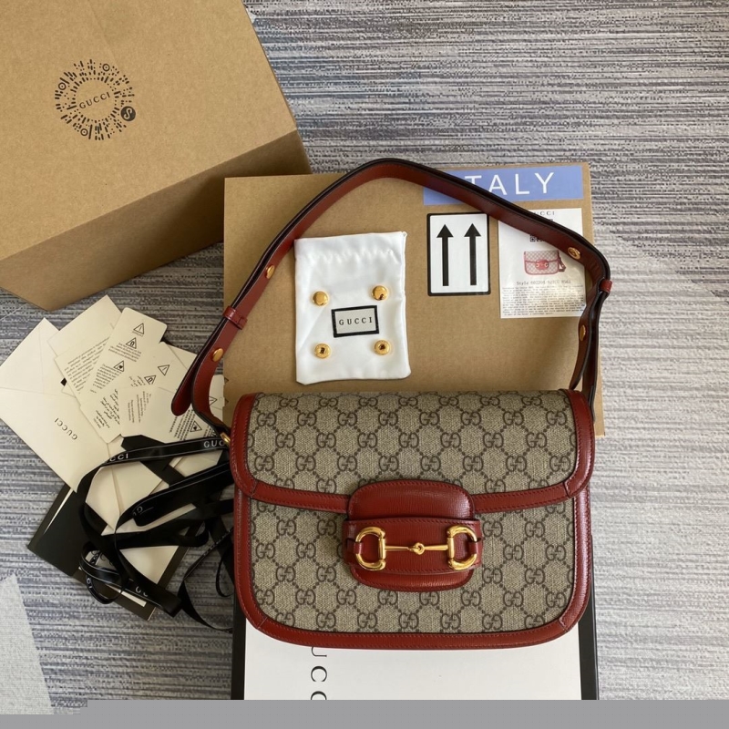 G*u*i top handle bags